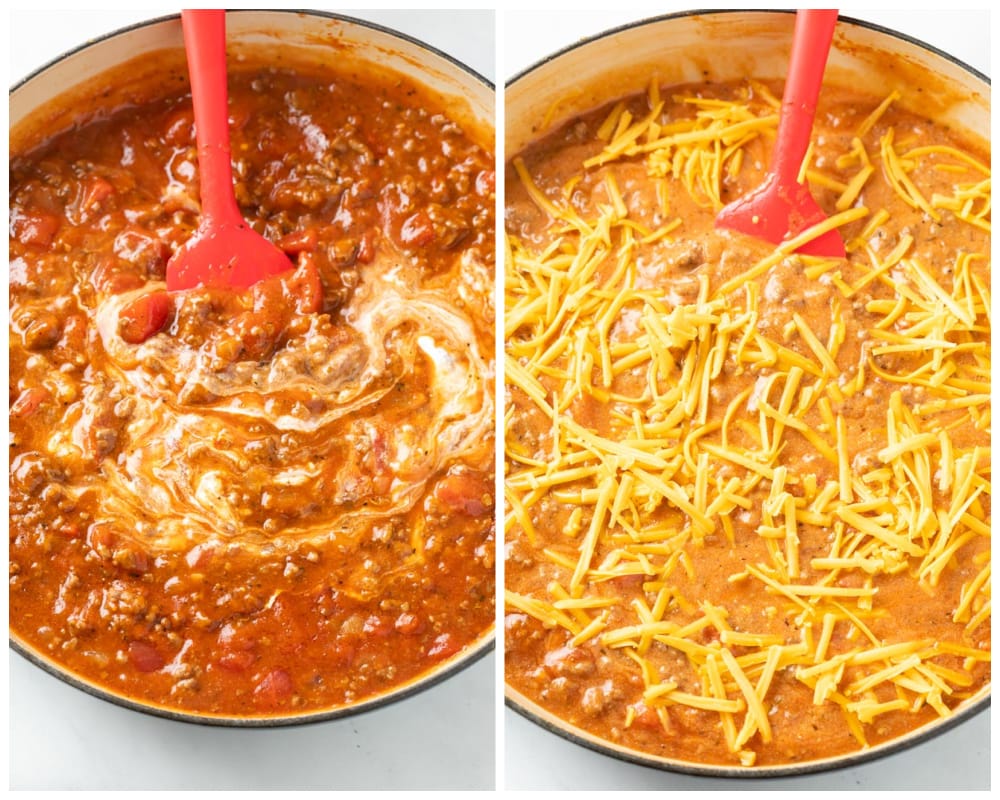 A pot filled with creamy tomato sauce with cheese being added for ground beef casserole.